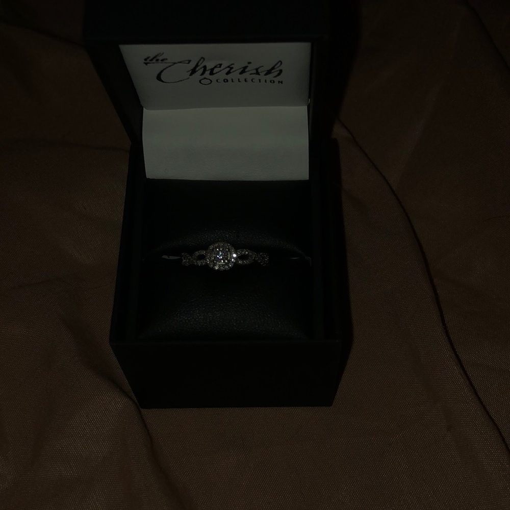 Size 7 real diamond and silver engagement ring
